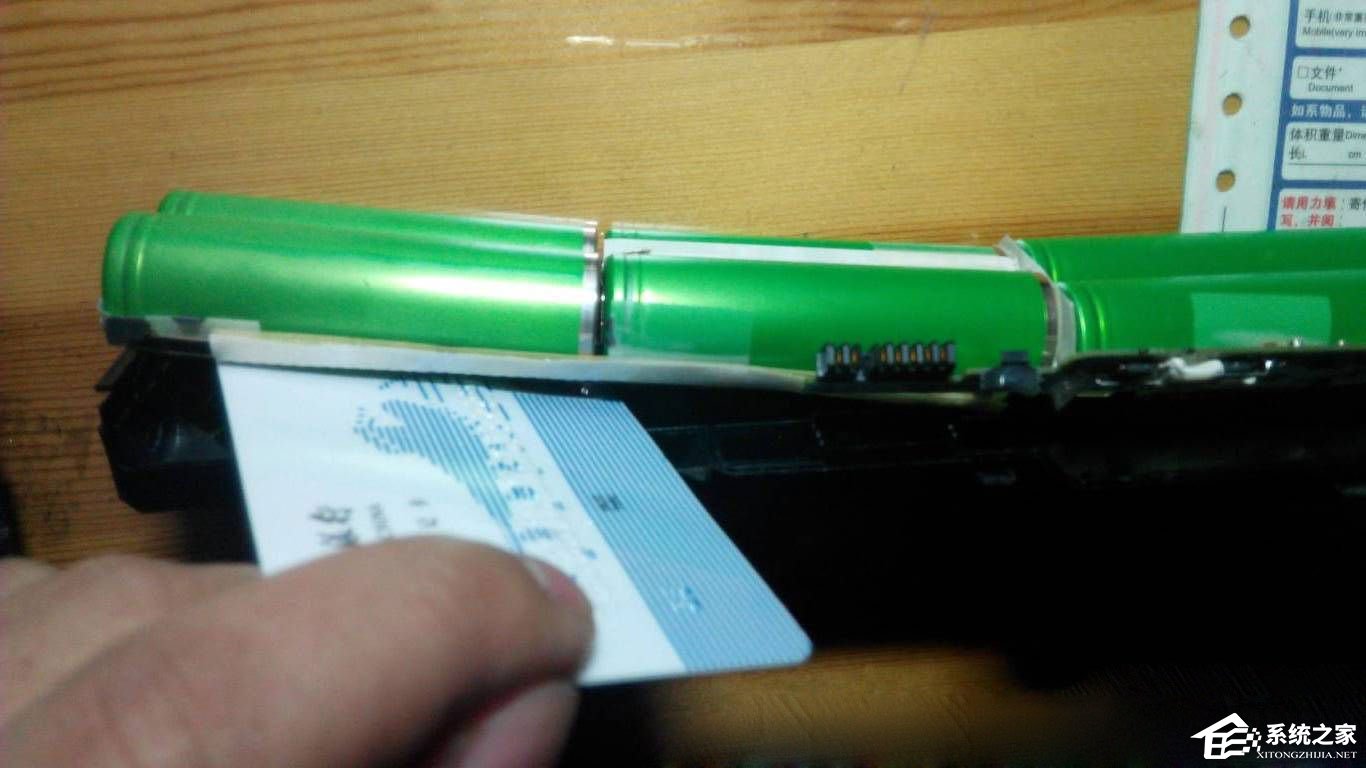 小编教你笔记本电池怎么拆解