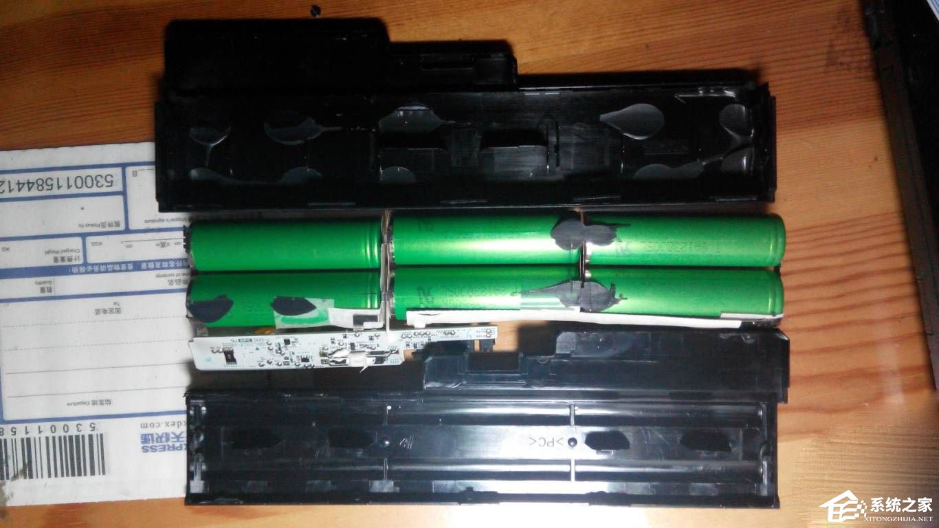 小编教你笔记本电池怎么拆解